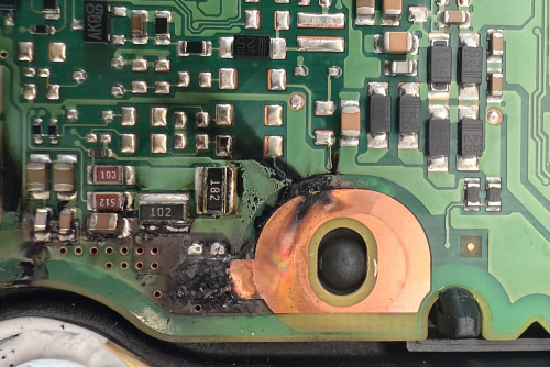 cropped image of man using digital tablet while fixing computer